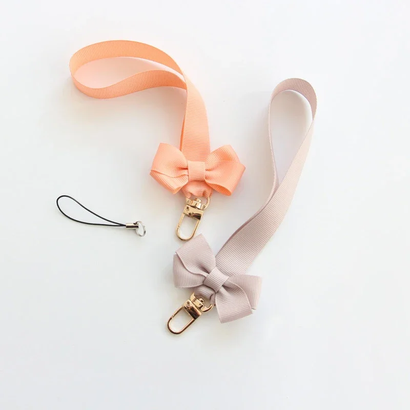 Trendy Bowknot Mobile Phone Ch - Fashion Women Picture のレビューと価格