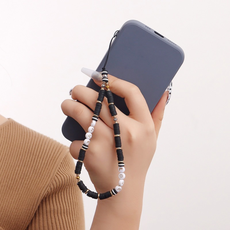 Fashion Devil's Eye Clay Phone - Fashion Women Picture のレビューと価格